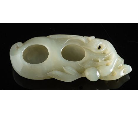 A jade double brush washer of pale celadon colour in the form of a peach, 11cm long.