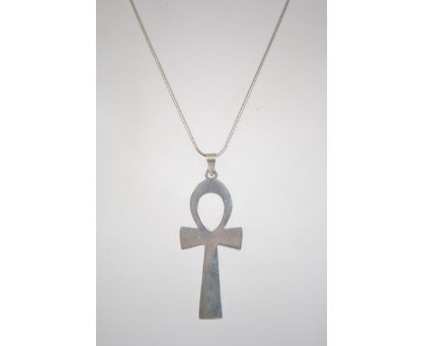 A fine snake linked silver 925 necklace chain adorned with a large silver 925 crucifix cross. Pendant measures 6.5cms long / 