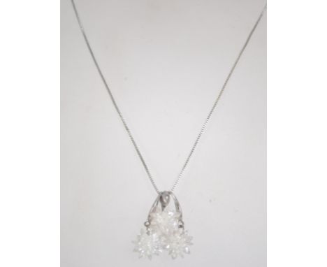 A silver 925 snowflake star box link necklace and earning set. Chain measures 16 inches weighs 8.5 grams
