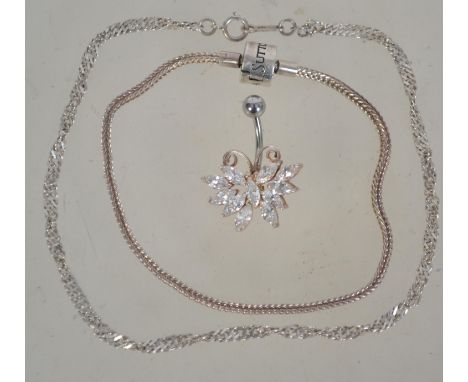 A silver 925 ladies anklet along with a Rhona Sutton bracelet and a silver 925 belly piercing in the form of a butterfly. Tot