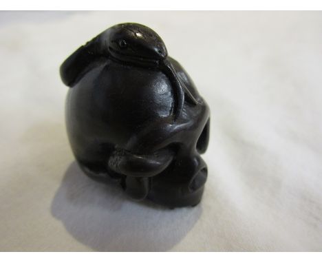 Signed Japanese carved wood netsuke - Skull &amp; snake