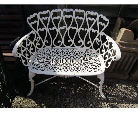 Painted white metal garden bench