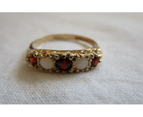 Gold garnet &amp; opal set ring