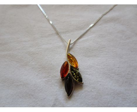 Silver amber pendant on chain