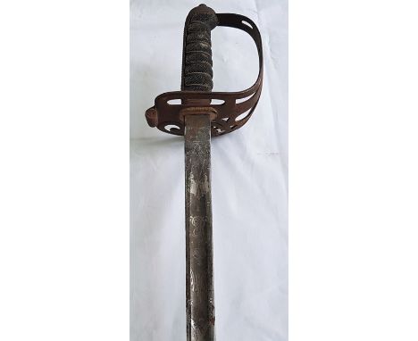 An Edward VII 1897 pattern infantry officer's sword and scabbard, with wire bound shagreen grip, blade length approx. 82.8cm,