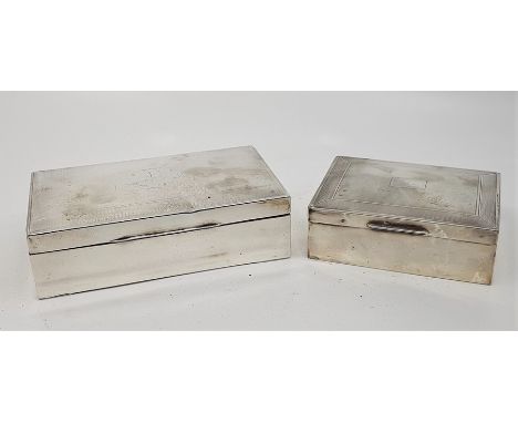Two engine turned rectangular silver cigarette boxes, the smaller by Harman Brothers, assayed Birmingham 1954, length 11.1cm,