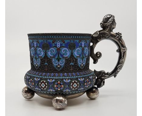 A late 19th century Imperial Russian silver-gilt and polychrome cloisonne enamel tea glass holder, by Pavel Akimovich Ovchinn