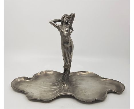 An Art Nouveau polished pewter figural centrepiece, cast as a maiden with flowing dress, the base stamped "AB with and angel,