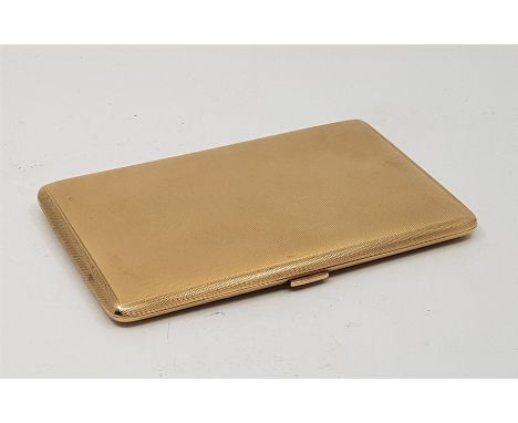 A 9ct. gold engine turned cigarette case, by Adie Brothers Ltd, assayed Birmingham 1946, interior with elastic retainer, 12.7