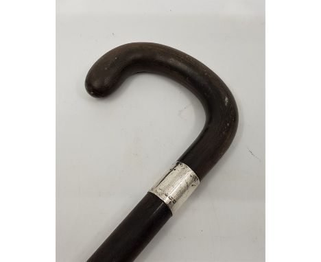 A horn handled walking stick, of greenheart with silver collar assayed Birmingham 1921, height approx. 91cm