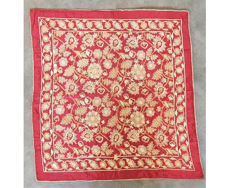 An late 19th century tapestry, red ground with gilt braiding