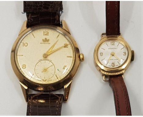 A 9ct. gold Marvin gentleman's wrist watch, c.1958, cal.520, manual movement, having signed circular champagne Arabic numeral