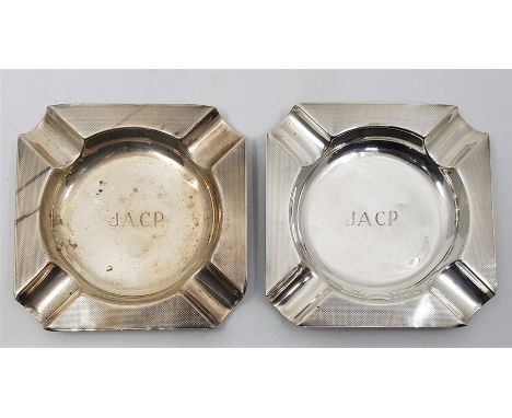 A pair of engine turned square silver ashtrays, by Boodle & Dunthorne, assayed Birmingham 1956-7, (124.5g). (2)