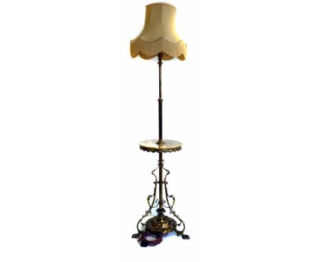 Art nouveau brass standard oil lamp converted to electricity, the fixed telescopic stem over a circular green marble tier, on