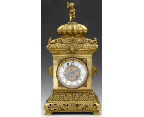 French cast brass rococo style mantel clock, late 19th century, the case of square section decorated with masks and scrolls, 