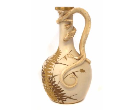 Royal Worcester Dragon handle jug, decorated with raised gilt leaves on a blush ivory ground, puce printed marks and 1887 dat