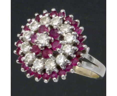 Ruby and diamond circular tiered cluster ring, diameter 17mm, London 1978, ring size M+, gross weight 5.6g