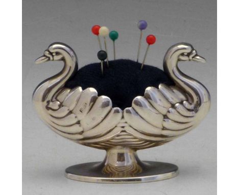 Silver pin cushion in the form of two opposing swans, Hilliard & Thomason, Birmingham 1896, width 6.5cm. Condition good no da