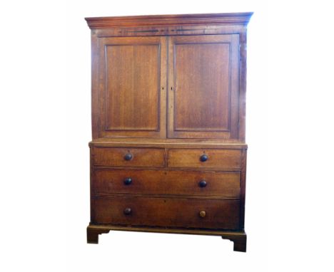 Victorian oak housekeeper's cupboard, of two doors enclosing painted shelves over two short and two long drawers on bracket f