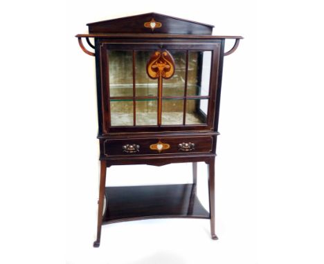 Art nouveau mahogany small display cabinet with boxwood and pewter inlay, of a single astragal door over a drawer and uniting