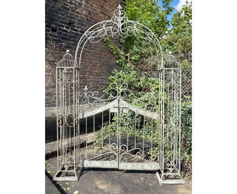 ARCHITECTURAL GARDEN GATES, in the Italian style, distressed metal frame, 250cm high, 185cm wide, 38cm deep. 