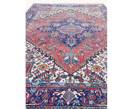 ANTIQUE PERSIAN HERIZ CARPET, 315cm x 250cm. 