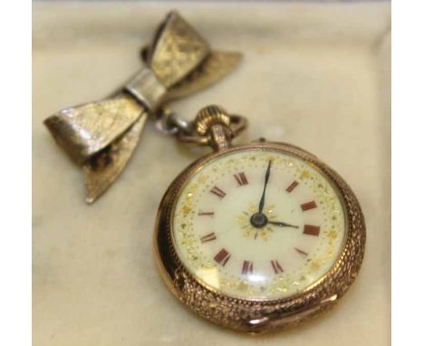 TWENTIETH CENTURY FOURTEEN CARAT GOLD OPEN FACE FOB WATCH WITH ENAMEL BIRD DETAIL
the white dial with foliate motif and Roman