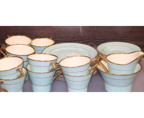 ROYAL ALBERT ART DECO STYLE TURQUOISE TEA SET
with gilt edging, eleven cups, saucers, side plates, sugar and cream