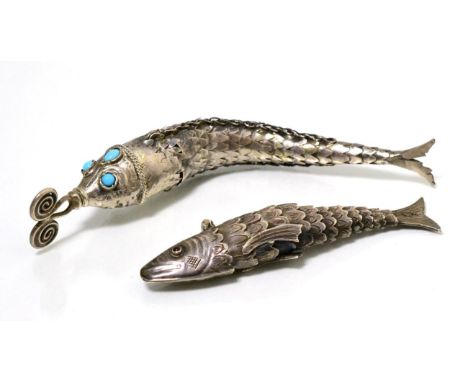 A Dutch silver articulated model of a fish with hinged head; together with a further white metal articulated model of a fish,