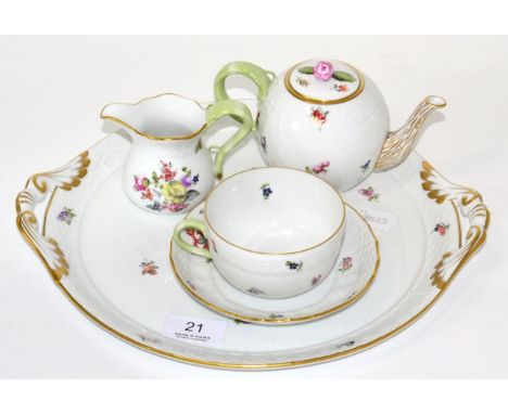 A Herend porcelain twin handled tray, teapot, tea cup and saucer and cream jug