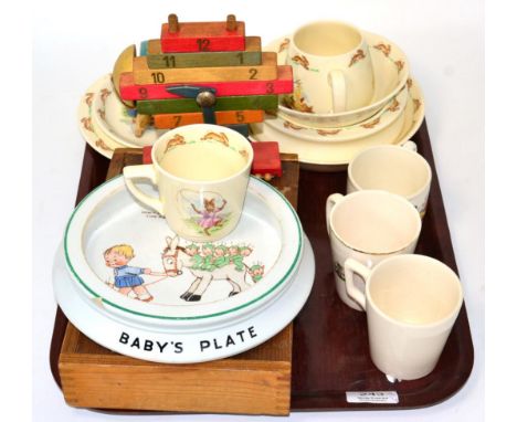 A group of Royal Doulton Bunnykins wares; Shelly Mabel Lucie Atwell baby plate; wooden toys, puzzles etc 