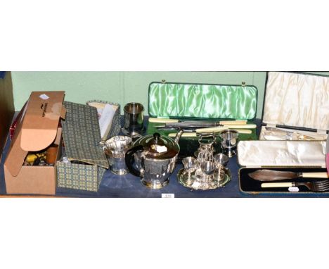 An electroplated three piece tea service; egg cruet; various boxed serving pieces; a group of corkscrews; a Japanese doll cir