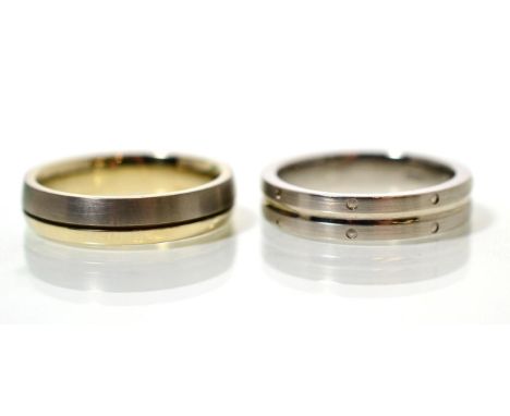 A palladium band ring, brushed polished with engraved decoration, finger size S, stamped 'PD950' and an 18 carat gold and tit