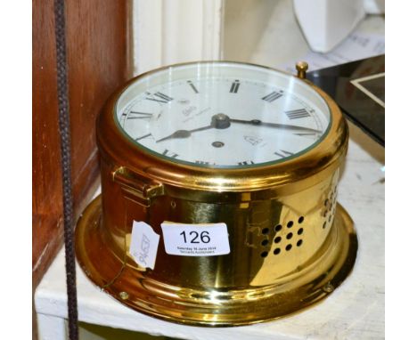 A lantern style foliot wall clock and a Schatz eight day ships type wall clock (2) 