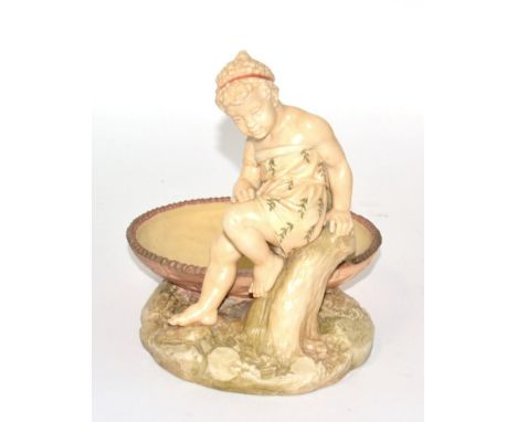 A Royal Worcester figural dish by James Hadley, shape number 1247, with impressed signature and date mark for 1888, 20cm