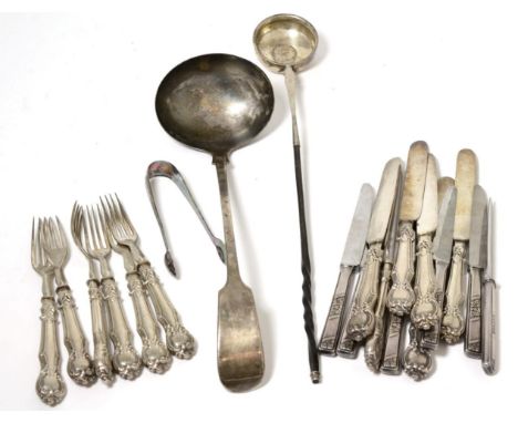 A toddy ladle, with coin set bowl and baleen handle; six pairs of William IV silver handled fruit knives and forks; a plated 