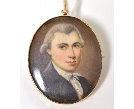 English School (circa 1800), miniature bust portrait of a Gentleman, with a wig, wearing grey jacket and white stock, oval, 3