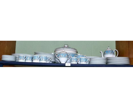 A Wedgwood Florentine dinner service comprising of twelve dinner plates; twelve soup plates; twelve pudding plates; twelve sa