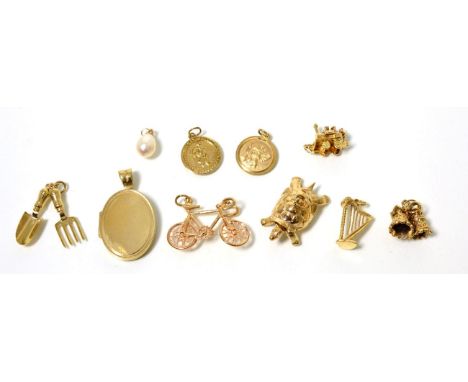 A 9 carat gold tortoise charm, with articulated legs and head, measures 3cm long; a 9 carat gold bicycle charm; a 9 carat gol