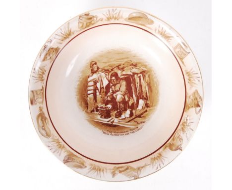 A Bruce Bairnsfather made ceramic Grimwades dish. Decorated with typical Bairnsfather scenes. Makers marks to reverse. 15cm d