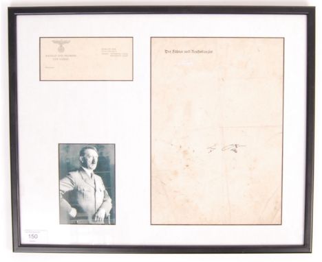 A believed original signature / autograph of Adolf Hitler. The ink signature being presented upon an original period sheet of