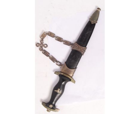 A replica 20th century Third Reich WWII Second World War German SS ceremonial dagger. With scabbard, hanger and emblems to ha