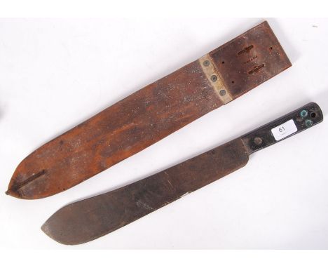 A vintage original WWII Second World War era military issue Machete. The blade stamped for JJB 1944. Complete with the origin