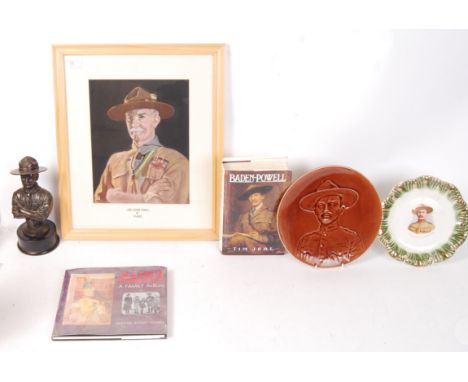 A collection of various items relating to Lord Baden- Powell to include; 2x decorative plates, a large boxed wooden bust of B