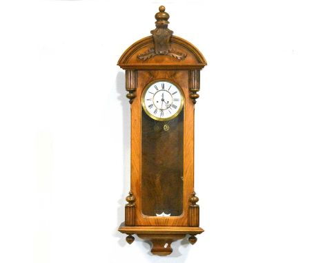 Walnut Vienna clock, domed pediment, enamelled dial with Roman numerals, twin-weight movement, the dial marked for Gustav Bec
