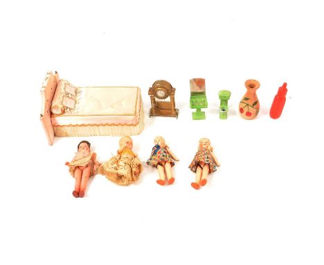 Dolls house furniture, miniature dolls, etc.Condition report:This lot comprises ten dolls, of various small sizes, and approx