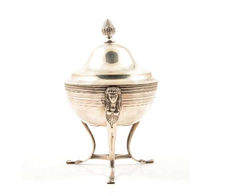 Italian silver lidded bonbon dish, domed lid with finial, the bowl with concentric bands, tripod legs with mask heads and hoo