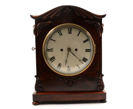 William IV rosewood mantel clock, arched case with pierced sides on bun feet, painted dial with Roman numerals, double fusee 