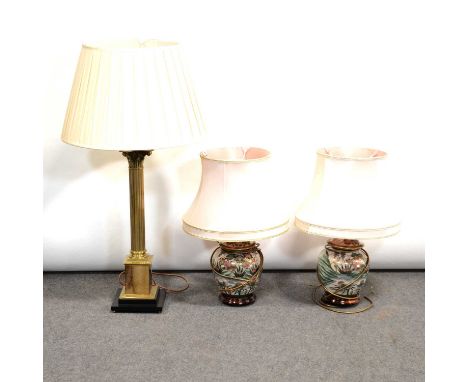 Brass Conrinthian column table lamp, with pleated shade, 96cm, and a pair of Japanese style pottery table lamps, with shades.