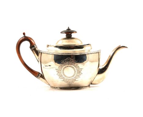 A George III silver teapot, Duncan Urquhart &amp; Naphtali Hart, London 1807, oval form with a large vacant cartouche to each
